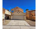Charming two-story home featuring a two-car garage and neutral color palette in a well-maintained neighborhood at 4064 Browndeer Cir, Las Vegas, NV 89129