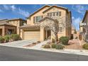 Charming two-story home with a well-maintained lawn and a two-car garage at 10316 Northern Hills Ave, Las Vegas, NV 89166