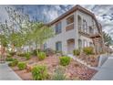 Exterior view of building with desert landscaping and wrought iron staircases at 2305 W Horizon Ridge Pkwy # 514, Henderson, NV 89052