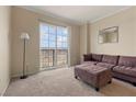Inviting living room featuring a large sliding glass door with great views and comfortable seating at 2405 W Serene Ave # 631, Las Vegas, NV 89123