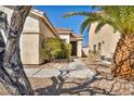 Charming single-story home with a well-maintained walkway, desert landscaping, and a welcoming entrance at 8732 Majestic Pine Ave, Las Vegas, NV 89143