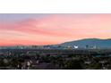 A scenic view of the city skyline at sunset at 1168 Spago Ln, Henderson, NV 89052
