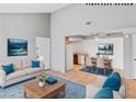 Inviting living room that flows into a dining area and kitchen creating a warm and connected living space at 1701 E Katie Ave # 36, Las Vegas, NV 89119