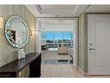Foyer leading to a luxury living area with floor to ceiling windows, city views and elegant decor at 2000 Fashion Show Dr # 6109, Las Vegas, NV 89109