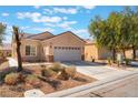 Charming single-story home featuring a two-car garage and low-maintenance desert landscaping at 3603 Herring Gull Ln, North Las Vegas, NV 89084