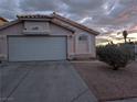 Cozy home with a two-car garage and desert landscaping in a quiet neighborhood at , Las Vegas, NV 89142