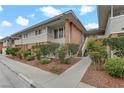Multi-Gathering home featuring well-maintained landscaping, brick accents, and direct stairwell access to the units at 2831 Geary Pl # 2912, Las Vegas, NV 89109