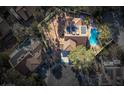 An aerial view shows the property's pool and solar panels at 2917 Chapala Dr, Las Vegas, NV 89120