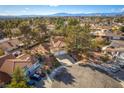 An aerial view of the home showcases its location in a tree-filled neighborhood at 2917 Chapala Dr, Las Vegas, NV 89120