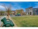 Community playground featuring colorful play equipment, offering a fun recreational space for children at 542 Foothill Cove Ln, Henderson, NV 89002