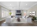 Bright living room featuring modern furnishings, recessed lighting, and elegant decor at 6335 Mount Eden Ave, Las Vegas, NV 89139