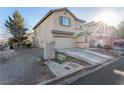 Inviting two-story home with a well-maintained yard and convenient community mailbox at 6527 Belgrave Hall Ln, Las Vegas, NV 89122