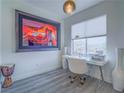 Inviting office space with a sleek desk, stylish decor, and ample natural light at 817 Peachy Canyon Cir # 204, Las Vegas, NV 89144