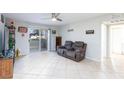 Comfortable living room featuring sliding glass doors to the outdoor patio area at 2300 E Silverado Ranch Blvd # 1037, Las Vegas, NV 89183
