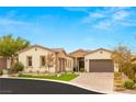 Charming single-story home with a well-manicured front yard and paver driveway at 4078 San Franchesca Ct, Las Vegas, NV 89141