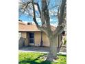 Inviting front entrance with neutral-colored siding and security door at 5083 Village Dr, Las Vegas, NV 89142