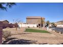 Community park area with gravel landscaping and a small patch of artificial grass at 5285 Bombazine St, Las Vegas, NV 89122