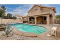 Private backyard pool with a covered patio, perfect for outdoor entertaining and relaxation at 6709 Rancho Santa Fe Dr, Las Vegas, NV 89130