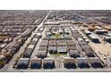 An aerial view of the community, highlighting the pool, playground, dog park, and proximity to local amenities at 760 Crisp Morning Ct, North Las Vegas, NV 89086