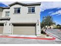 A front shot of the home's garage, showcasing its clean lines and curb appeal in a residential neighborhood at 760 Crisp Morning Ct, North Las Vegas, NV 89086