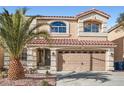 Inviting two-story home with a tile roof, desert landscaping, and a spacious two-car garage at 830 Beartooth Falls Ct, Henderson, NV 89052