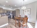 Cozy dining area off the kitchen, with room for four, is the perfect spot for casual meals at 251 S Green Valley Pkwy # 3412, Henderson, NV 89012