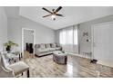 Bright living room with hard surface floors, neutral decor and plenty of natural light at 3305 Palomar St, North Las Vegas, NV 89030