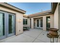 Private courtyard with a cozy seating area, perfect for outdoor relaxation at 3801 W Hammer Ln, North Las Vegas, NV 89031