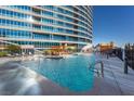 Beautiful outdoor pool area featuring inviting lounge chairs and landscaping at 4575 Dean Martin Dr # 3007, Las Vegas, NV 89103