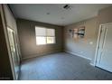 Bright bedroom with tile flooring, neutral colored walls, and direct outdoor access through a sliding door at , Las Vegas, NV 89148