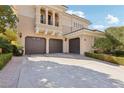 Spacious three-car garage with ample driveway parking at 3863 Glasgow Green Dr, Las Vegas, NV 89141