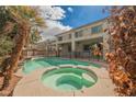 Backyard featuring a private pool and spa, perfect for outdoor relaxation at 4208 Lower Saxon Ave, North Las Vegas, NV 89085