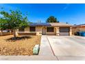 Charming single-story home featuring solar panels, a well-maintained yard, and a convenient attached garage at 4360 Wendy Ln, Las Vegas, NV 89115
