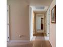 Hallway showing access to different rooms in the house with carpet flooring at 4411 Alexis Dr # 444, Las Vegas, NV 89103