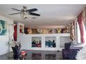 Spacious living room with tile floors and unique architectural details at 4701 Sacks Dr, Las Vegas, NV 89122