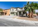 Beautiful home featuring desert landscaping, a three-car garage and a welcoming front entry at 6220 Silver Edge St, North Las Vegas, NV 89031