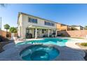 Backyard pool and spa for relaxing outdoors under the sunny skies at 6220 Silver Edge St, North Las Vegas, NV 89031
