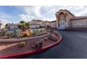 Attractive clubhouse with desert landscaping at 6700 Amarinta Ave # 104, Las Vegas, NV 89108