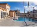 Enjoy the refreshing pool and lounge area at 6700 Amarinta Ave # 104, Las Vegas, NV 89108