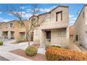 Inviting home exterior with a covered porch and landscaped front yard that enhances its curb appeal at 9132 Gabardine Ave, Las Vegas, NV 89149