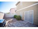 Patio and a view of the exterior of the home at 9906 Fife Lake Ct, Las Vegas, NV 89148