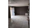 Living room with tile flooring and a modern paint scheme at 116 Continental Ave, Henderson, NV 89015