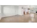 Open living room with tile entrance and view of kitchen with white appliances at 1701 E Katie Ave # 21, Las Vegas, NV 89119