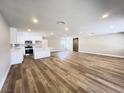 Spacious living room with recessed lighting and open floor plan leading to the kitchen at 4485 Greenhill Dr, Las Vegas, NV 89121