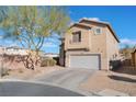 Charming stucco home with a two-car garage and well-maintained landscaping in a desirable neighborhood at 6552 Casamar St, North Las Vegas, NV 89086
