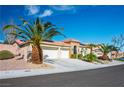 Inviting single-story home featuring a three-car garage, tile roof, and mature palm trees at 1516 Barrington Oaks St, North Las Vegas, NV 89084