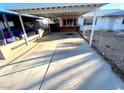 Carport attached to a home, providing sheltered parking at 2208 E Ogden Ave, Las Vegas, NV 89101