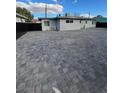 Spacious paved backyard perfect for outdoor activities and entertaining at 321 Beaumont St, Las Vegas, NV 89106