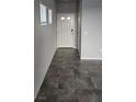 Spacious entryway with tile flooring and ample natural light from multiple windows at 3816 Seyfert Ave, North Las Vegas, NV 89084