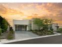 Contemporary home with a large garage and well-manicured landscaping at 515 Serenity Point Dr, Henderson, NV 89012